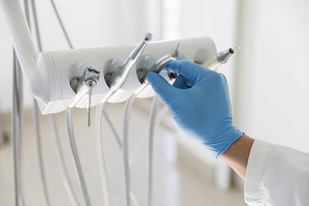 Professional Tooth Extraction technician working in Pleasant Hill, MO